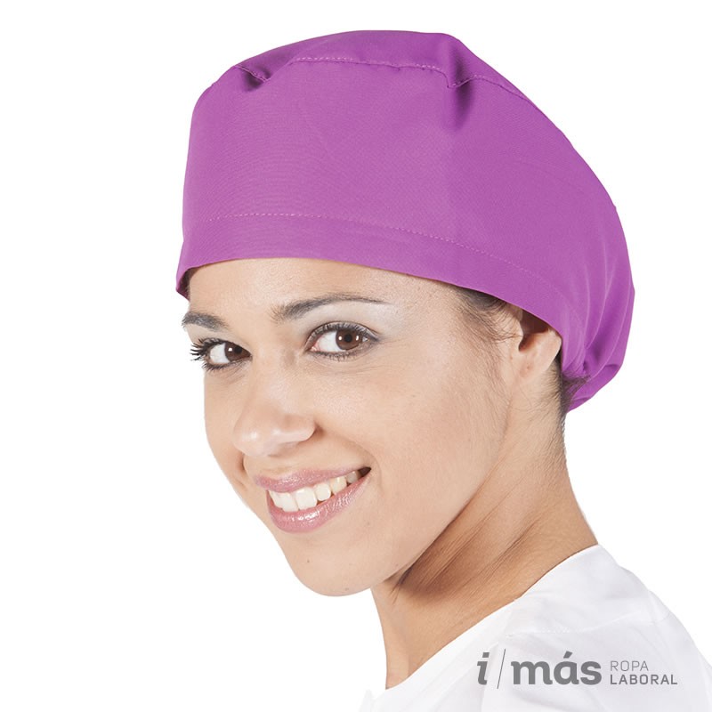 Gorro de quirófano en microfibra malva con goma, pensado para pelo largo.